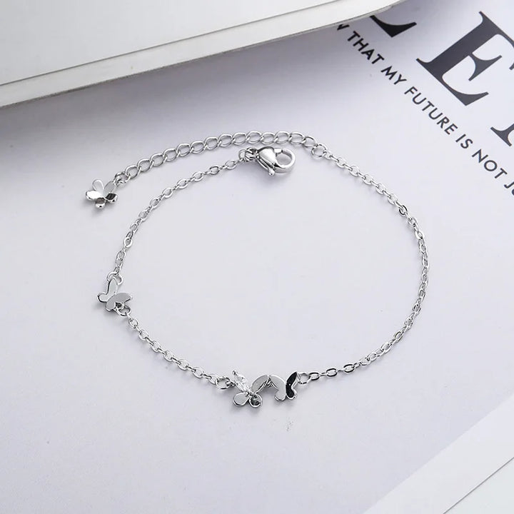 Silver Butterfly Bracelet with Diamond Studs