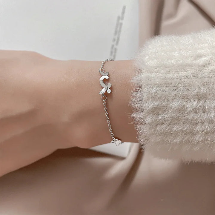 Silver Butterfly Bracelet with Diamond Studs